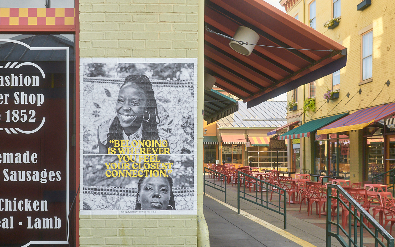 An "On Belonging" portrait installed at Over-the-Rhine's Findlay Market.