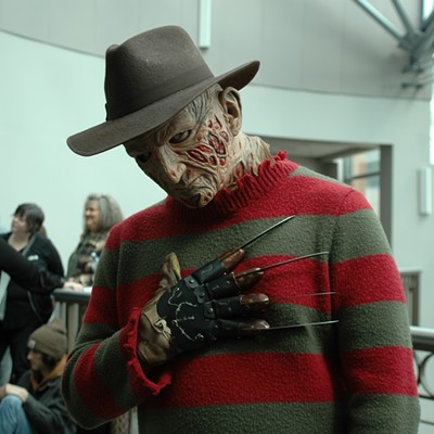 A fan dressed as Freddy Krueger from A Nightmare on Elm Street