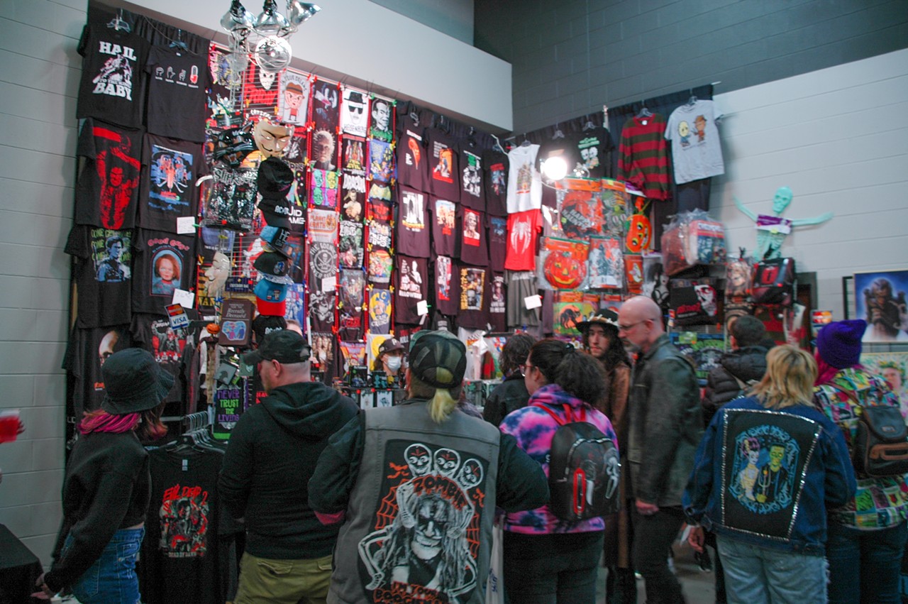 T-shirts featuring various horror and pop culture franchises lined the walls as attendees browsed.