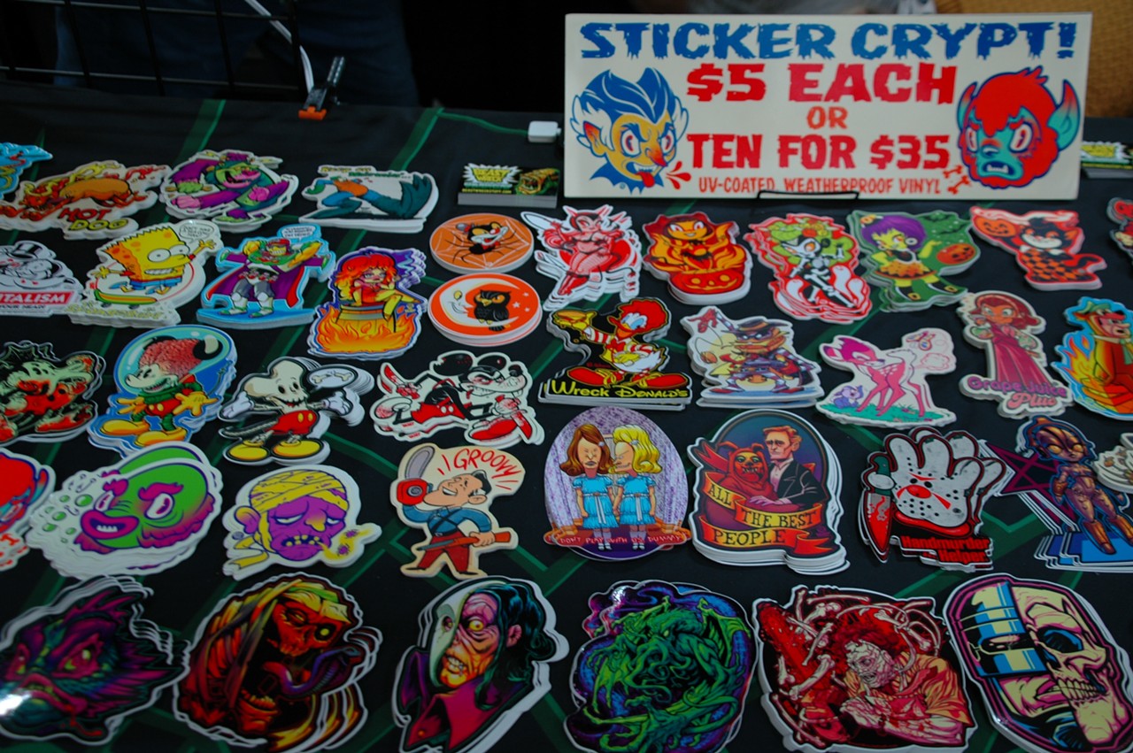 Colorful assortment of macabre and cute stickers at the BeastWreck Stuff booth
