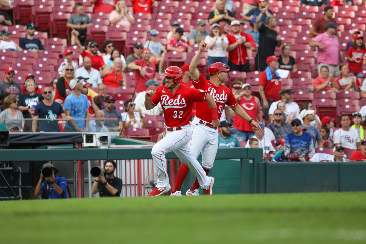 Hunter Renfroe rounds third to score off Tyler Stephenson's double to the left in the bottom of the seventh inning during the Cincinnati Reds' game against the Seattle Mariners on Sept. 4, 2023.
