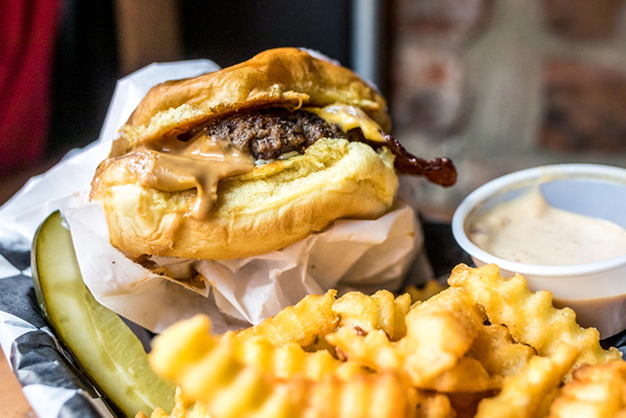 Creative twists include burgers like the Cobra Kai, topped with cream cheese, pickled jalapenos and jalapeno jelly; or the Elvis, which comes topped with peanut butter, mayo, bacon and American-Cheddar cheese.