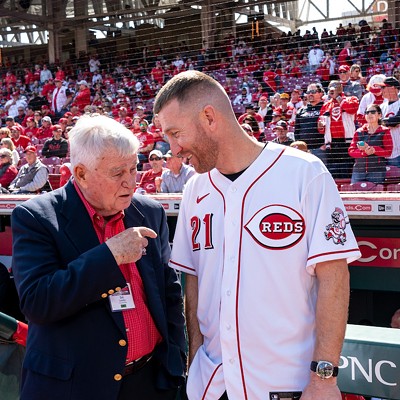 Cincinnati Reds team owner Bob Castellini (left) chats with former infielder Todd Frazier before the season opener at Great American Ball Park on March 30, 2023.
