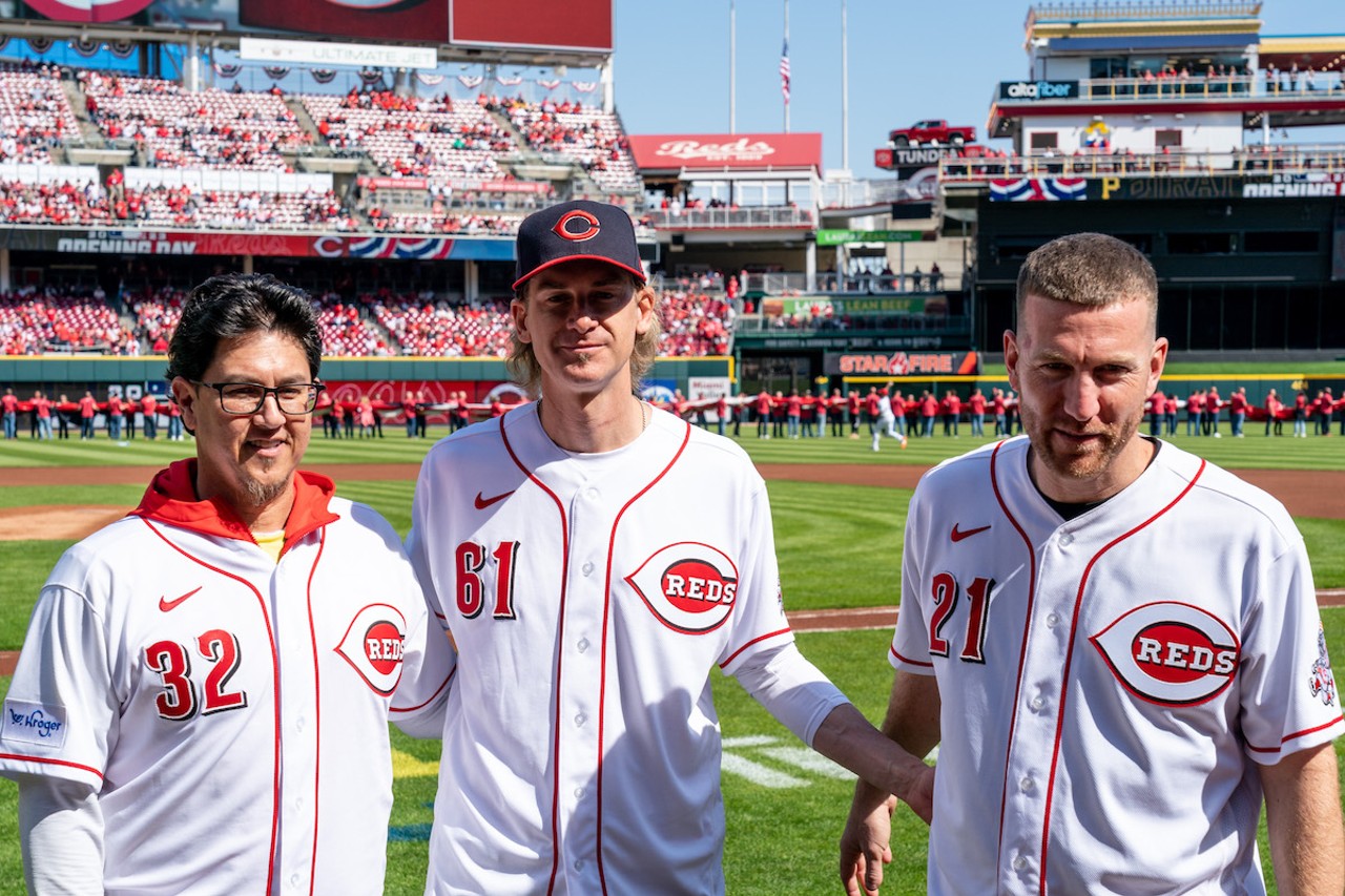 Former Cincinnati Reds pitchers Danny Graves (left) and Bronson Arroyo and former infielder Todd Frazier take part in events before the season opener at Great American Ball Park on March 30, 2023.
