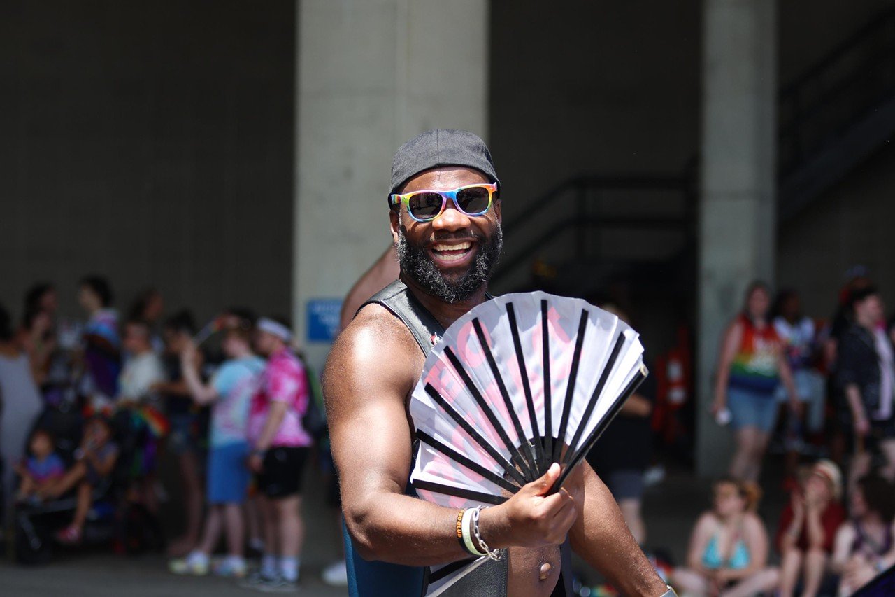 A man smiles at the Pride festival on Saturday, June 22, 2024.