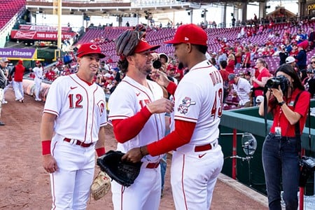 Spencer Steer, Kyle Farmer and Alexis Diaz have fun as the Cincinnati Reds host the Chicago Cubs at Great American Ball Park on Oct. 5, 2022.