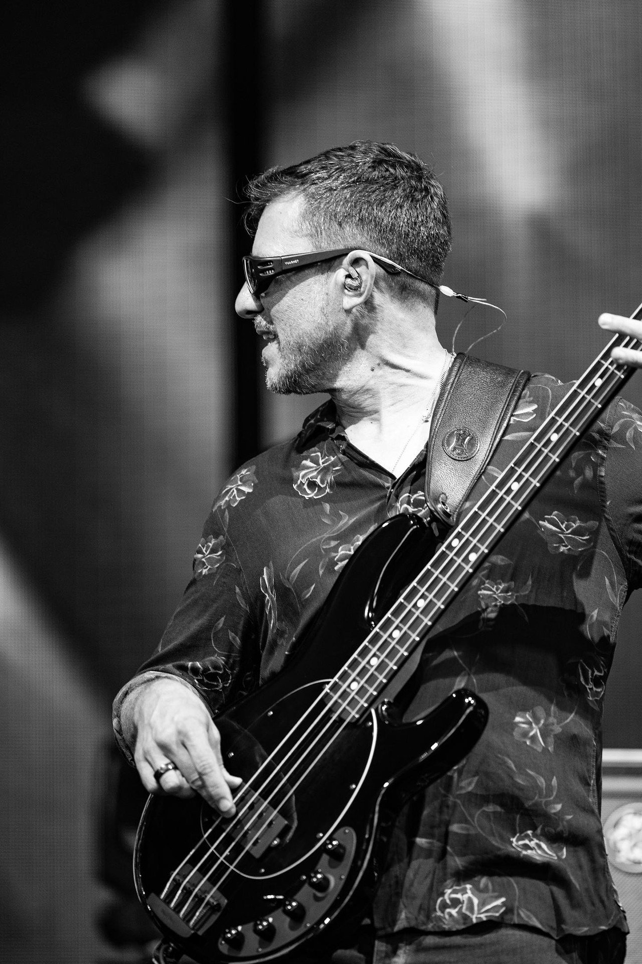 Bass guitarist for the Dave Matthews Band, Stefan Lessard, plays at Ruoff Music Center on Friday, June 28, 2024.