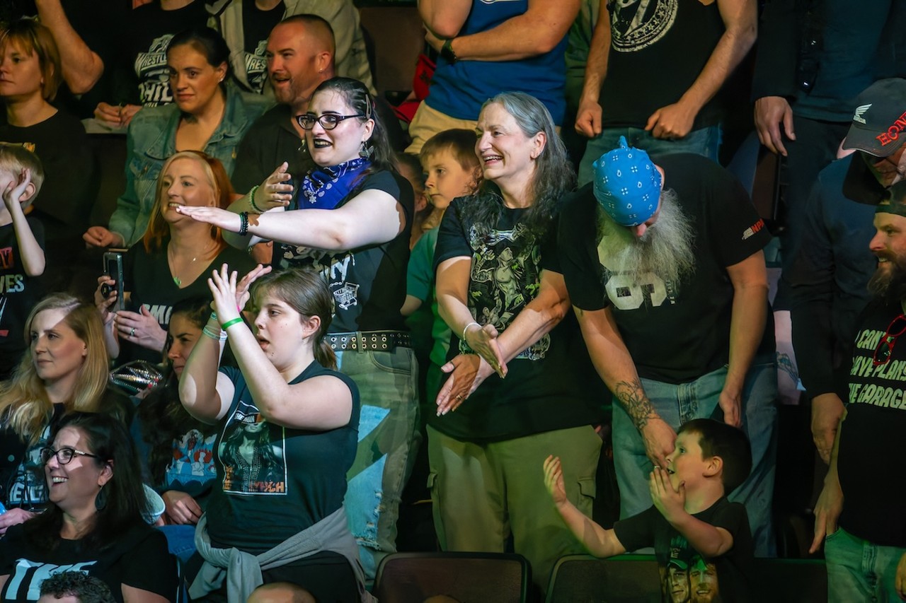 Cincinnati has two words for you — fans demonstrate the suck it chop during the DX Cam | WWE Smackdown at Heritage Bank Center on April 26, 2024