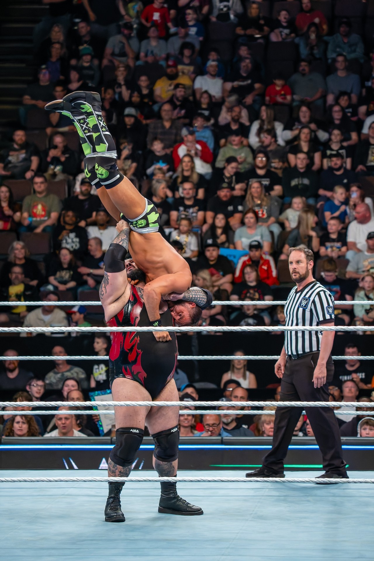 Bronson Reed demonstrates strength by holding Johnny Gargano in the air | WWE Smackdown at Heritage Bank Center on April 26, 2024