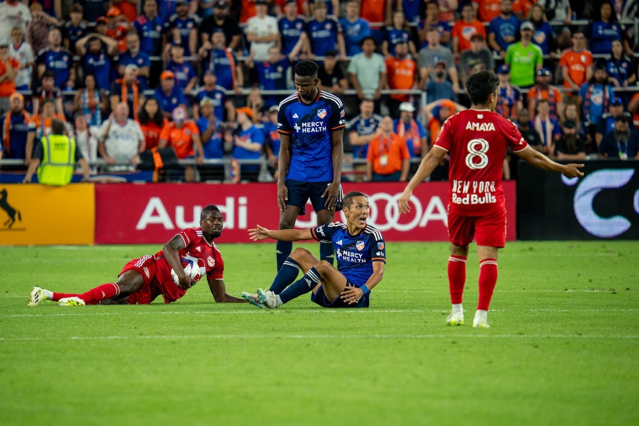 FC Cincinnati forward Yuyu Kubo calls for the referee's attention as a New York Red Bulls player covers the ball | FC Cincinnati vs. New York Red Bulls | Oct. 4, 2023