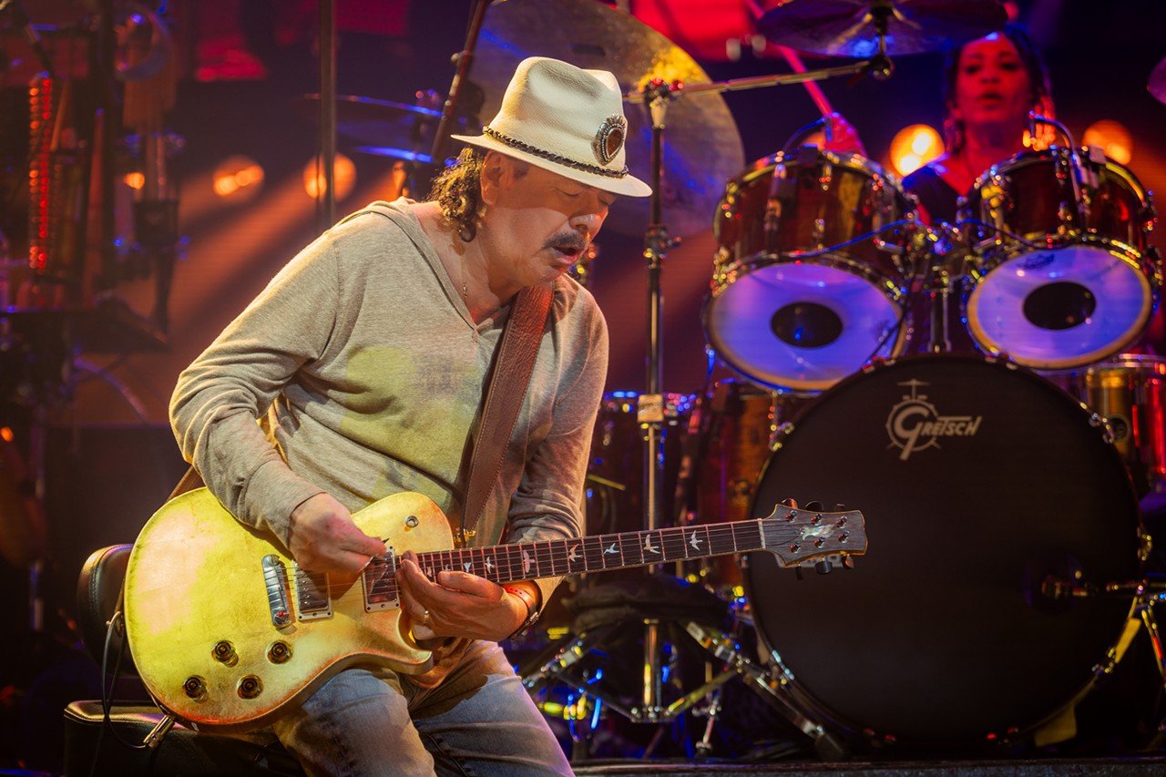 Lead singer of Santana, Carlos Santana, plays at Riverbend Music Center on Friday, June 28, 2024.