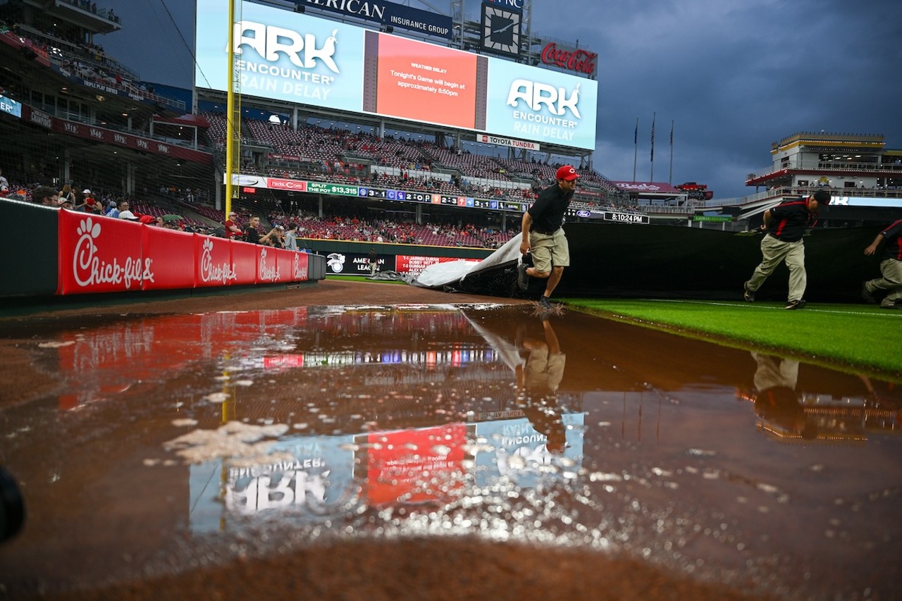 Cincinnati Reds crew pull the tarp off the field after a two-hour rain delay | Cincinnati Reds vs. Baltimore Orioles | May 3, 2024