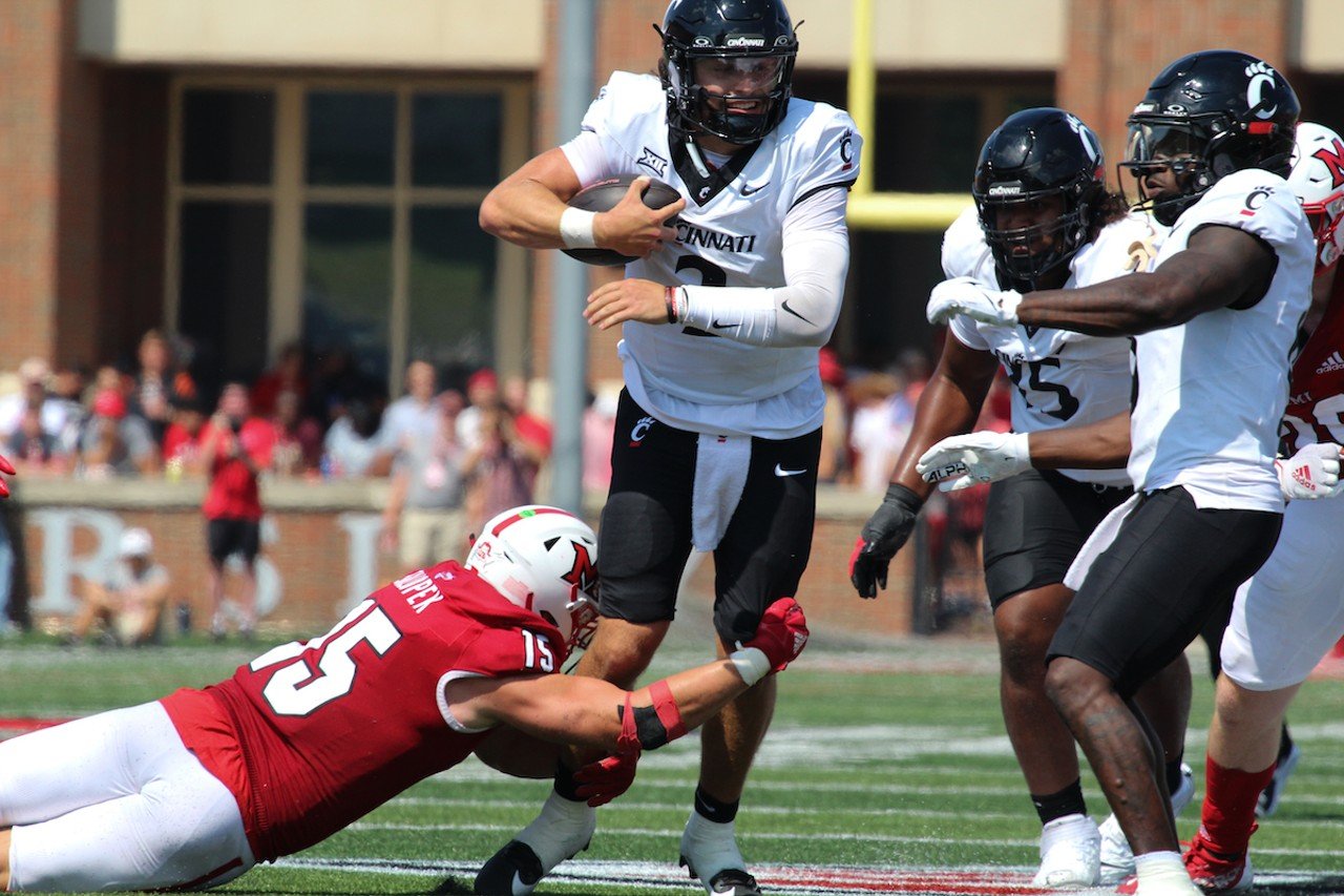 UC quarterback Brendan Sorsby is tackled.