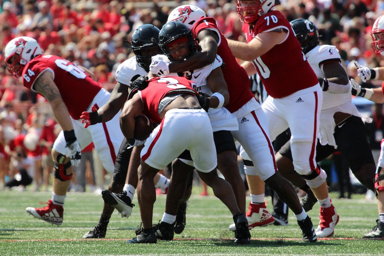 A play during the annual University of Cincinnati and Miami University rival football match on Saturday, Sept. 14, 2024.