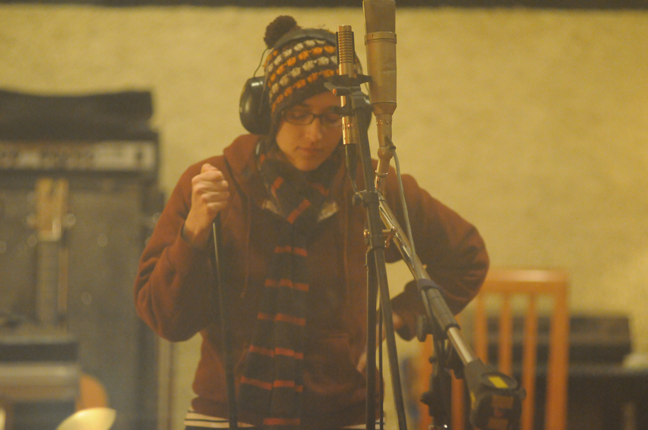 Margaret Darling of The Seedy Seeds recording vocals.