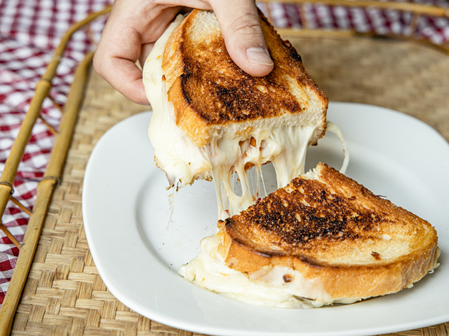 Share: Cheesebar's Bee Sting grilled cheese, with mozzarella, pepperoni, basil-infused honey and chili flakes on Tuscan pane