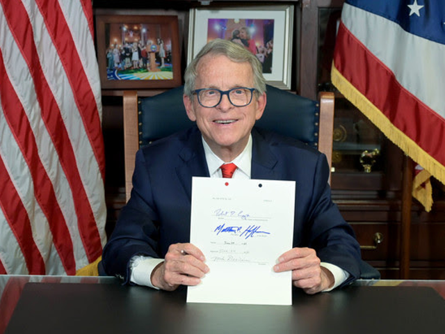 Gov. Mike DeWine signed the $74 billion, two-year state budget on Wednesday evening.