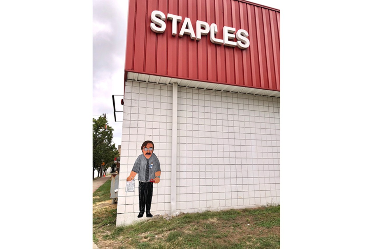 &#147;Remote Worker&#148;
Location: Downtown
Description: "Milton has just gotten his newest tps report from bill lumbergh. Not only is his stapler being taken but he has been told to work remotely outside a local staples. Poor Milton is even going go miss the free birthday cake inside."