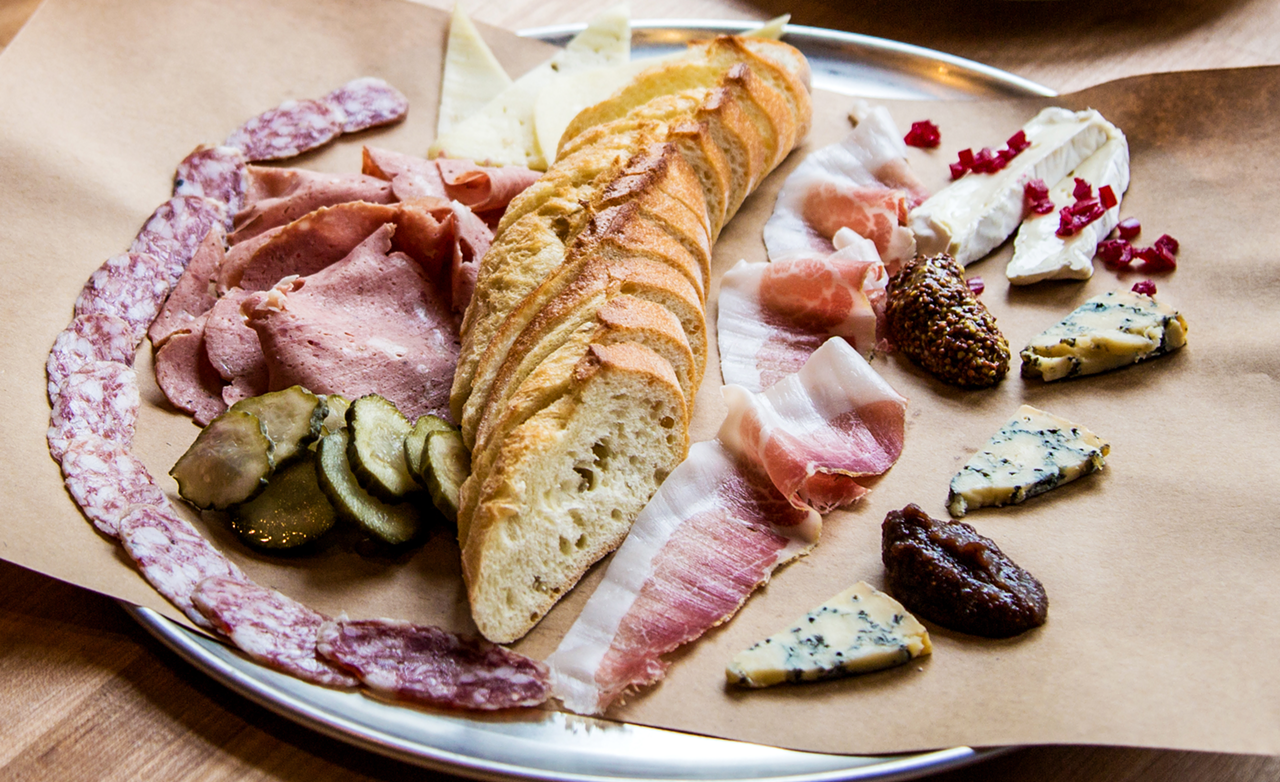 Nino Loreto's handcrafted cured meats — salumi, mortadella, capicola and more — show up in a starring role on the charcuterie platters at Panino, his OTR eatery and sandwich shop. Sit at the bar and enjoy his meaty art (all sourced from the restaurant's basement curing chamber) paired with a selection of local cheeses and "appropriate accoutrement."