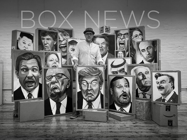 Artist Paul Kroner standing in front of works of art included in his "Box News" series.
