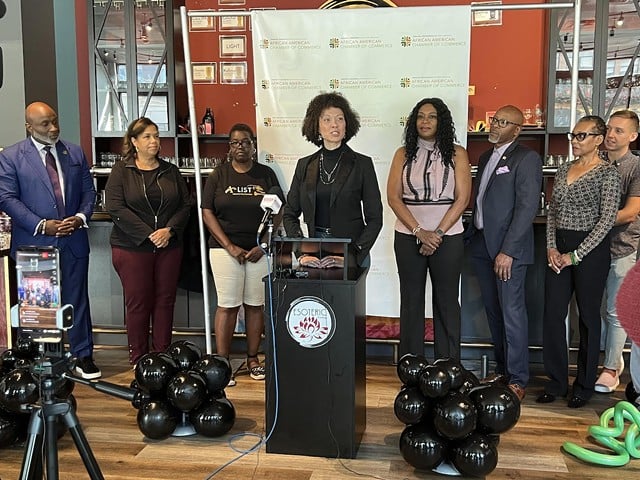 Briston Mitchell, director of transformative initiatives and relationships for the Greater Cincinnati and Northern Kentucky African American Chamber of Commerce, speaks during a press event  at Esoteric Brewing Company Sept. 19, 2022.