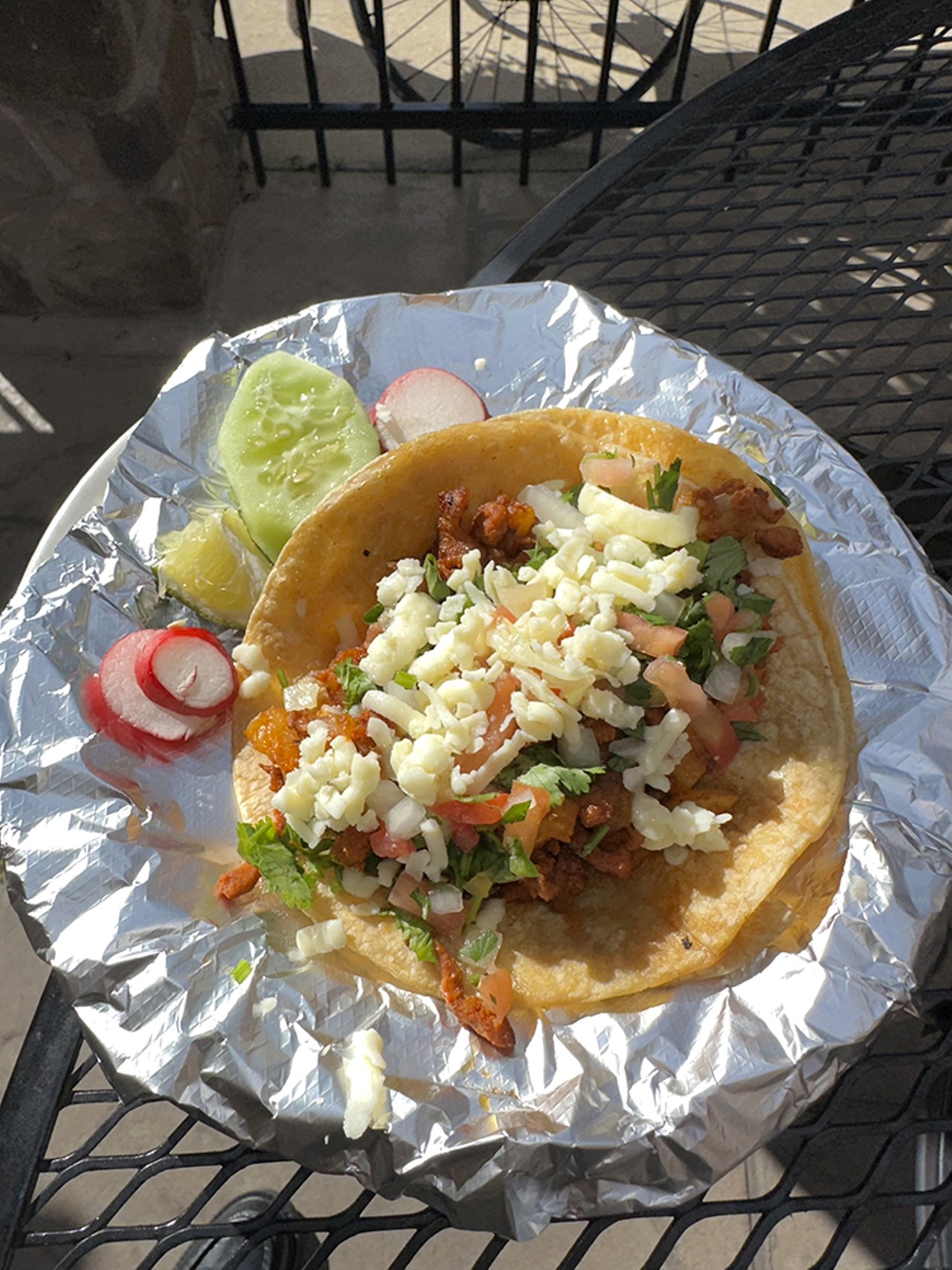 El Taco Veloz
7 Martin Luther King Dr., Corryville
Taco Veloz: Here you have a soft shelled corn tortilla which has Marinated pork as well as pineapple topped with onion, cilantro, pico de gallo, and cheese.