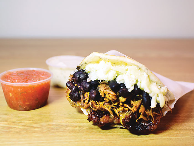 A rich and cheesey beef arepa from The Arepa Place Latin Grill