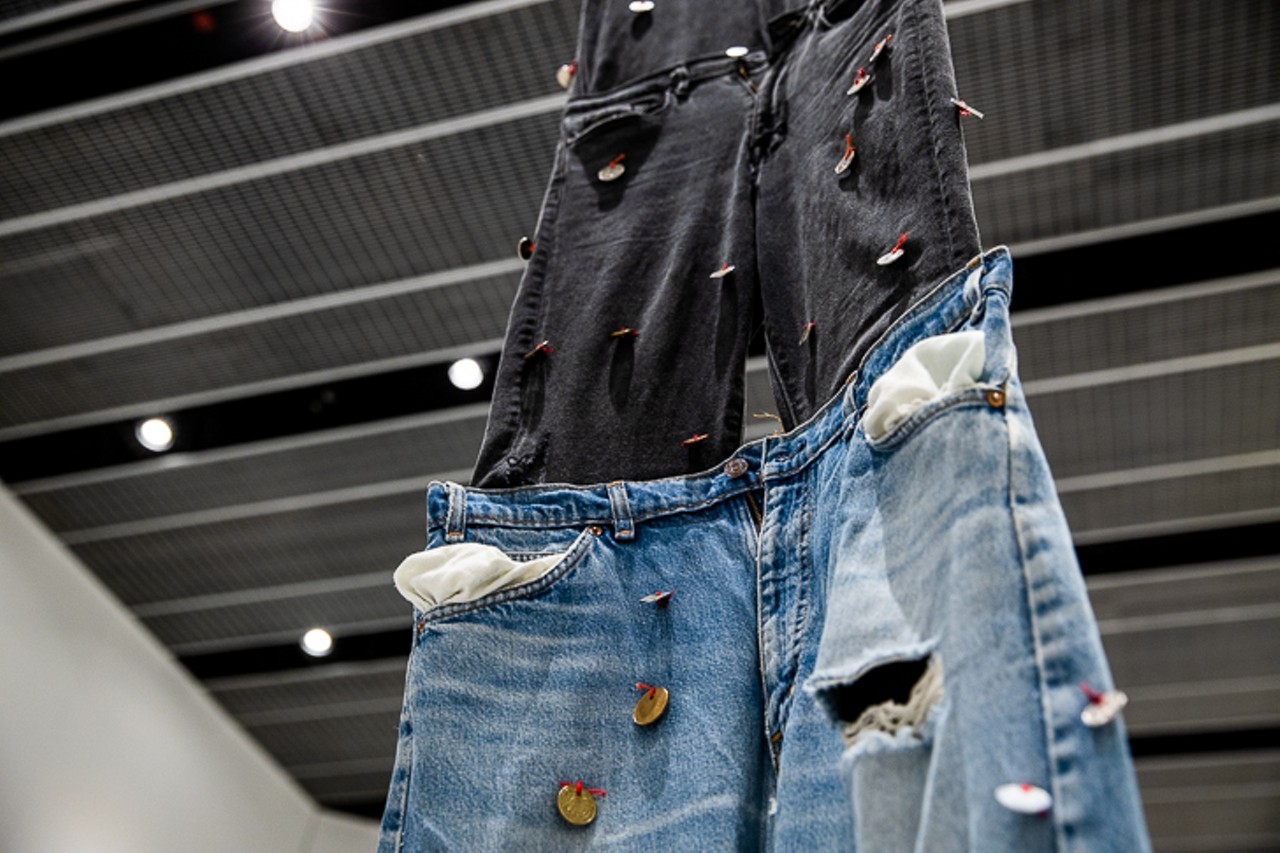 "Over and Over," is made with used jeans, thread, coins and rope