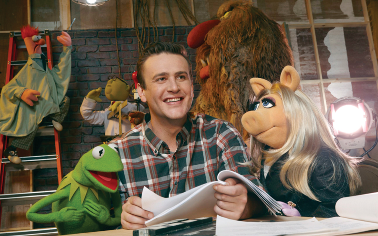 In hog heaven: Jason Segel with his idols, Kermit and Miss Piggy, in 'The Muppets'