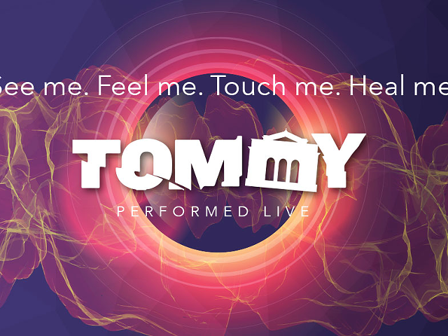 Banner for local production of "The Who's Tommy" shows a Memorial Hall-shaped second "M."