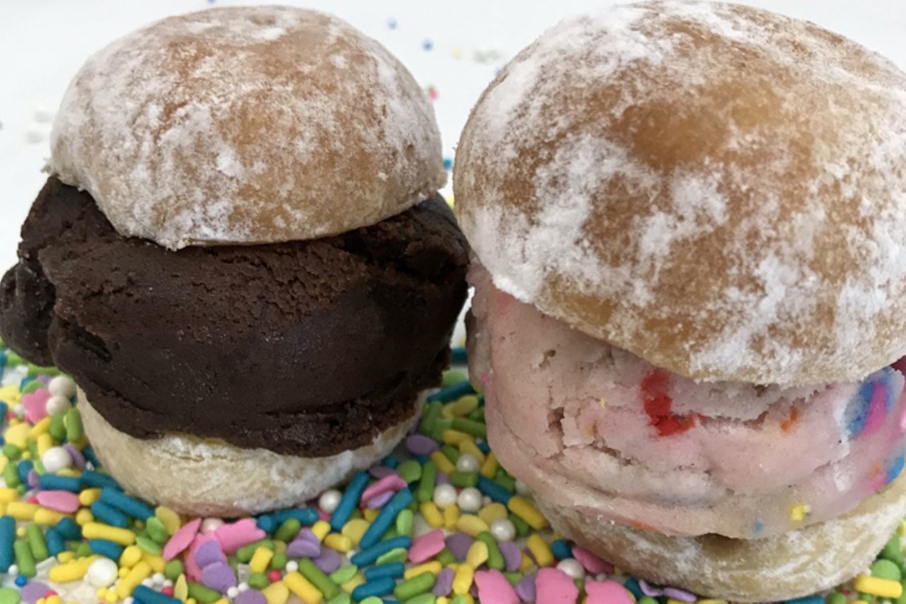 Tres Belle Cakes
8921 Reading Road, Reading
BEIGNET SLIDERS: One fluffy berry filled beignet bun with edible rainbow sugar cookie dough patty and one decadent Nutella filled beignet bun with edible chocolate brownie cookie dough patty.