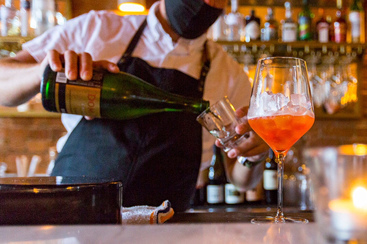 No. 8 Best New Bar: Saeso
1208 Sycamore St., Pendleton
If you&#146;re looking for an otherworldly escape without leaving the city, or a cocktail menu that takes the work out of ordering, Saeso might just be your new neighborhood bar. Christy Wulfson and Michael Guilfoil, the duo behind the petite Pendleton bar, created a space where they&#146;d like to sit and enjoy a cocktail and invited you to join. You can linger, say yes to that second drink and bask in the terracotta glow. The bar recently teamed up with local taco pop-up Pata Roja to transform the patio into a taco haven, as well as shifted their back bar into "The Cantina," offering margaritas, house cocktails and a variety of cervezas to pair with your meal &#151; enjoyed for dine-in or to take and enjoy at home. 
Photo: Ross Van Pelt