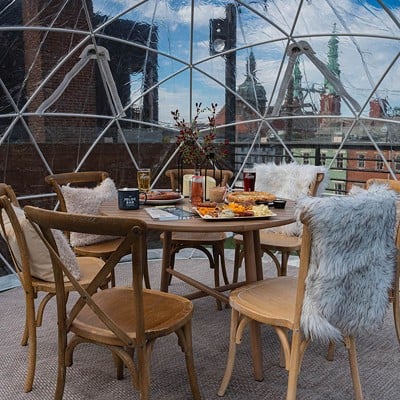 Dine Al Fresco While Staying Warm at These Restaurants and BarsJust because the mercury's dropping doesn't mean you have to move the party inside. There are a number of restaurants, bars and breweries in the Queen City offering ways to eat, drink and stay warm on their patios and rooftops this winter, whether you're looking for an igloo to cozy up in with your friends and family or if you want to gather 'round a firepit with other winter revelers. You can find a list of places where you can eat, drink and be cozy outside this winter in the link above.