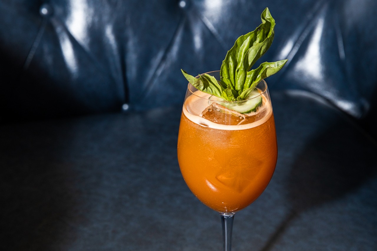 Error Resolution cocktail ($10) off of the brunch cocktail menu, made with Pimms, carrot, lime, curry, cucumbers, basil and Prosecco