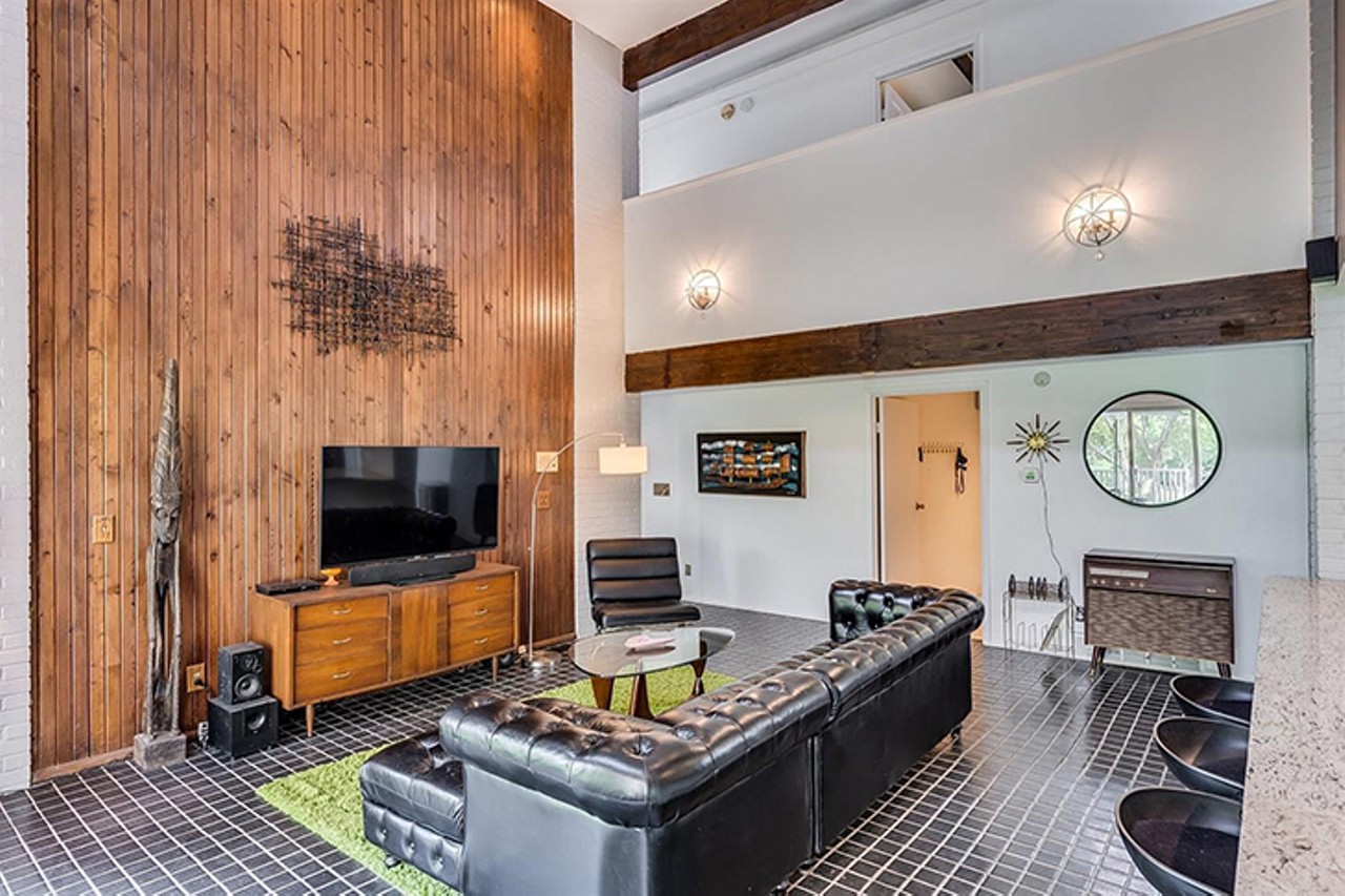 This Midcentury Modern Forest Park Home Has a Groovy Basement Tiki Bar