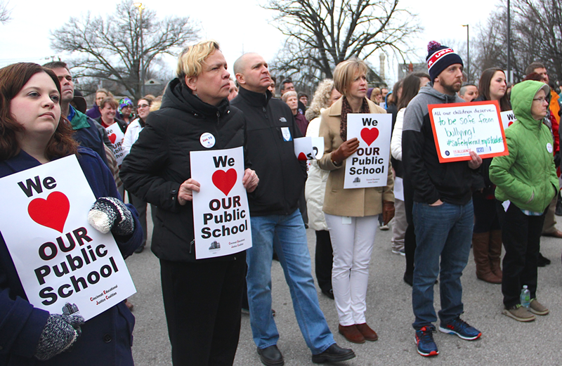 Education advocates gather at an event protesting Donald Trump secretary of education nominee Betsy DeVos. - Nick Swartsell