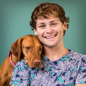 Comedian Drew Lynch and his service dog, Stella. - Provided by Drew Lynch
