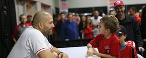 Joey Votto greets a young fan - Photo: Redsfest