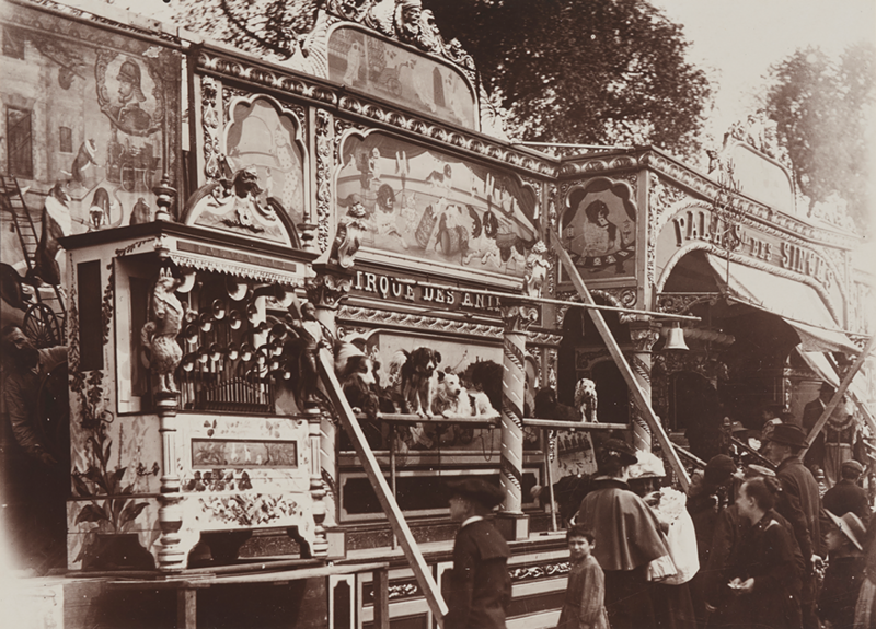 Eugène Atget, printed by Berenice Abbott, "Animal Circus at  the Invalides Square (Fête  des  Invalides)", 1898 (negative),  about 1930 (print), gelatin silver print. - Courtesy  of  the  Philadelphia  Museum  of  Art:  Gift  of  Mr.  and  Mrs.  Carl  Zigrosser,  1968,  1968–162–34