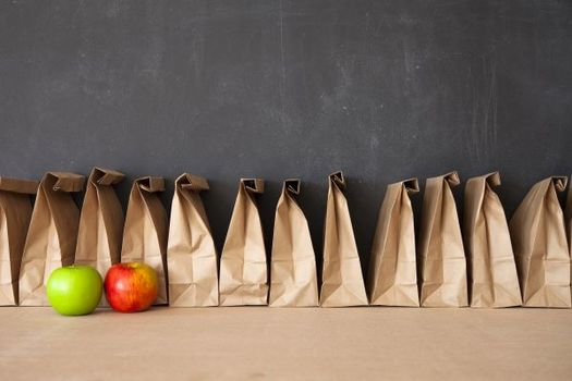 Grab-and-go meals have been helpful in expanding the reach of traditional school nutrition programs during the pandemic. - Photo: Adobe Stock