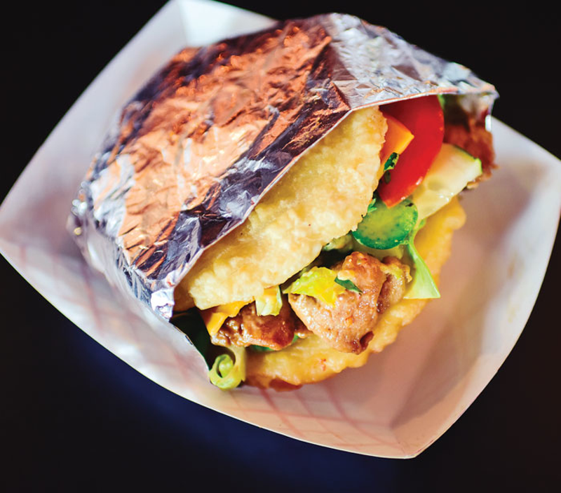 Sushi Monk’s food truck serves ramen, sushi burritos and rice burgers — cheese, cucumber, avocado and your choice of protein sandwiched between two lightly fried rice patties. - Photo: Jesse Fox
