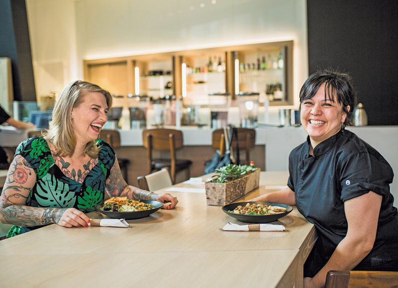 Molly Wellmann (left) and Lisa Kagen of Wellmann’s Brands expanded the café space in the Contemporary Arts Center to accommodate more food, more seating and a new bar. - Photo: Hailey Bollinger