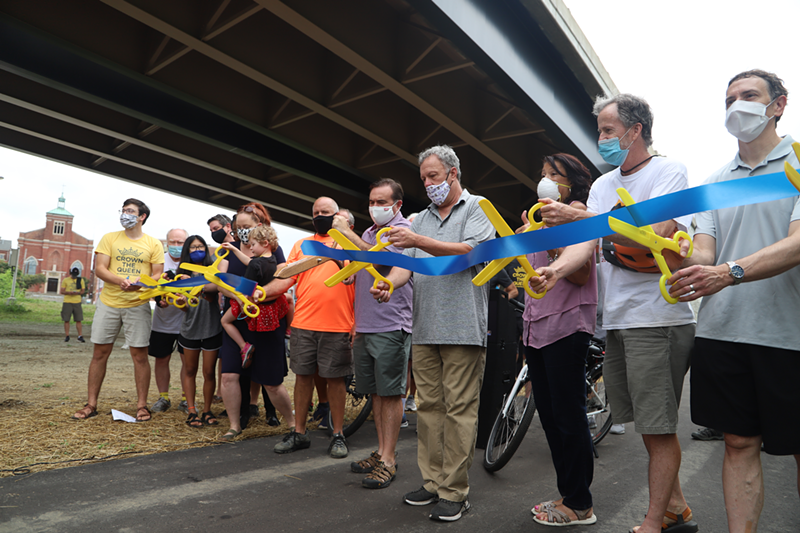 Officials and supporters cut the ribbon for the new .6 mile stretch of the Ohio River West Trail in Lower Price Hill - Photo: Nick Swartsell
