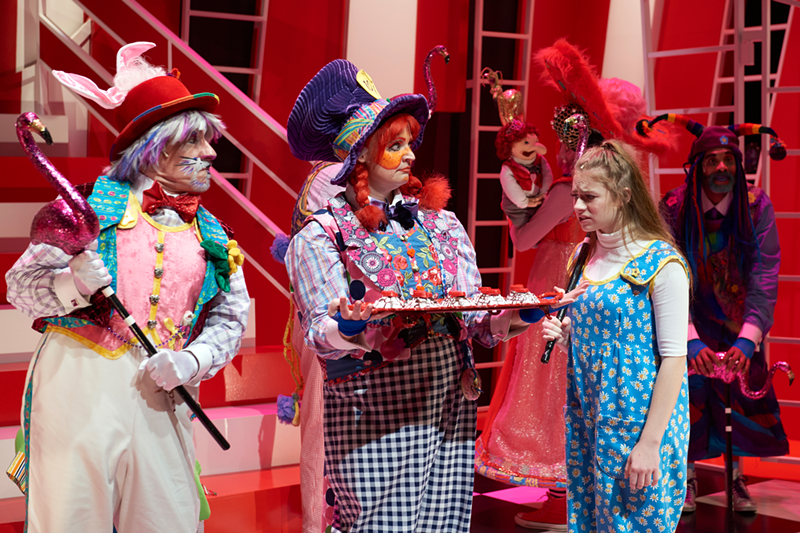 From Left: Michael G. Bath as White Rabbit; Sara Mackie as  Mad Hatter; Deej Ragusa  as Alice; in back, Deb G. Girdler as Queen of Hearts and Kenneth Early as Caterpillar/Butterfly. - Ryan Kurtz