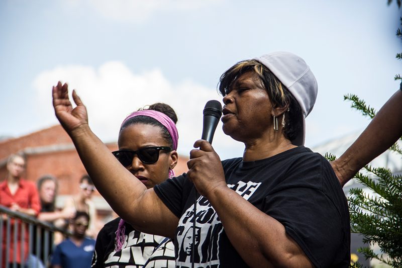 Audrey DuBose addresses a crowd of more than 4,000 at a Black Lives Matter rally July 10 outside CPD headquarters in the West End. - Nick Swartsell