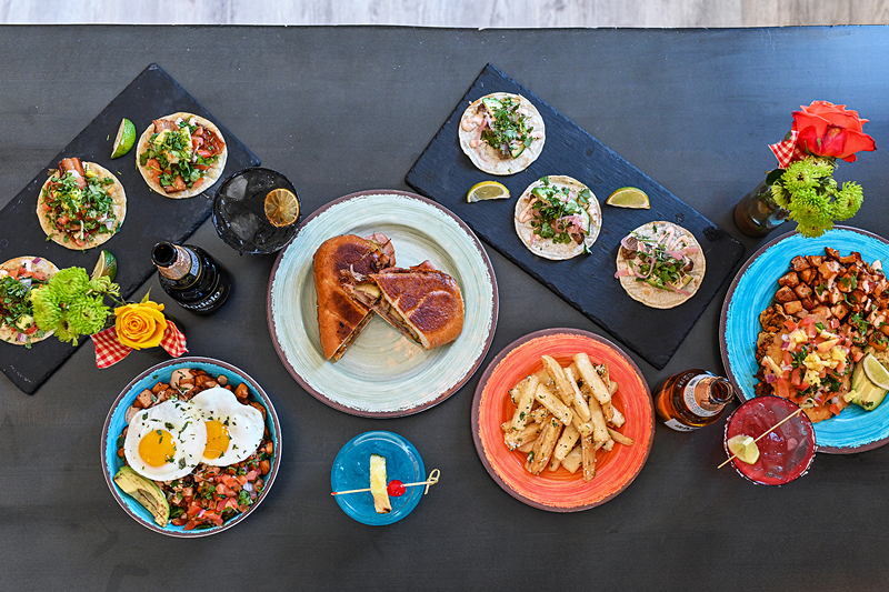 A spread of dishes and drinks that will be available at Yuca - Photo: Francisco Huerta