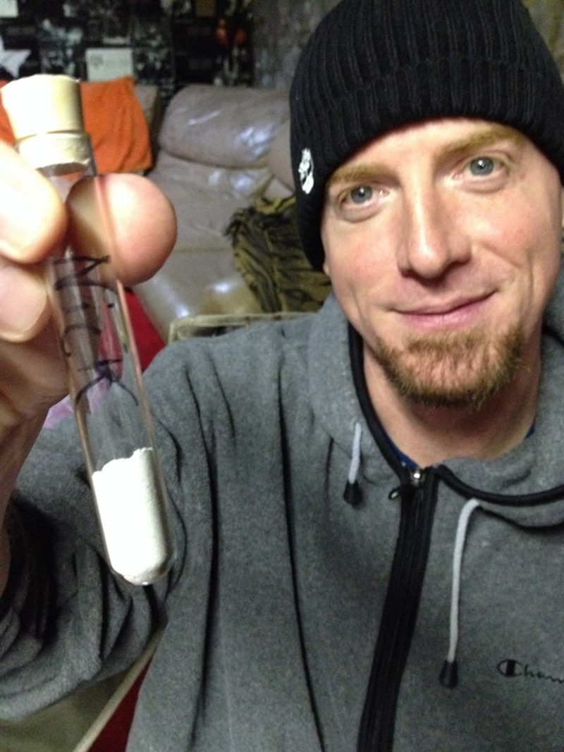 Dying Fetus member holds up vial of fan's ashes, asks Facebook followers if they should sprinkle them on the pit (they did)