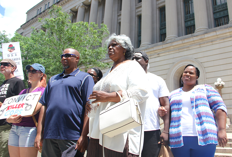 Audrey DuBose, other members of the DuBose family and activists stand outside the Hamilton County Courthouse after closing statements in the retrial of Ray Tensing - Nick Swartsell