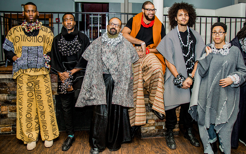 Da’Mon Butler (center) and models wear his clothing designs at a recent show. - Photo: Hailey Bollinger