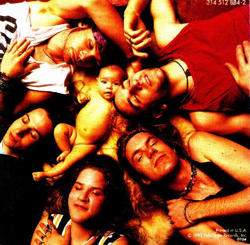 Mother Love Bone, with Andrew Wood (under the baby leg) (Photo: PolyGram Records)